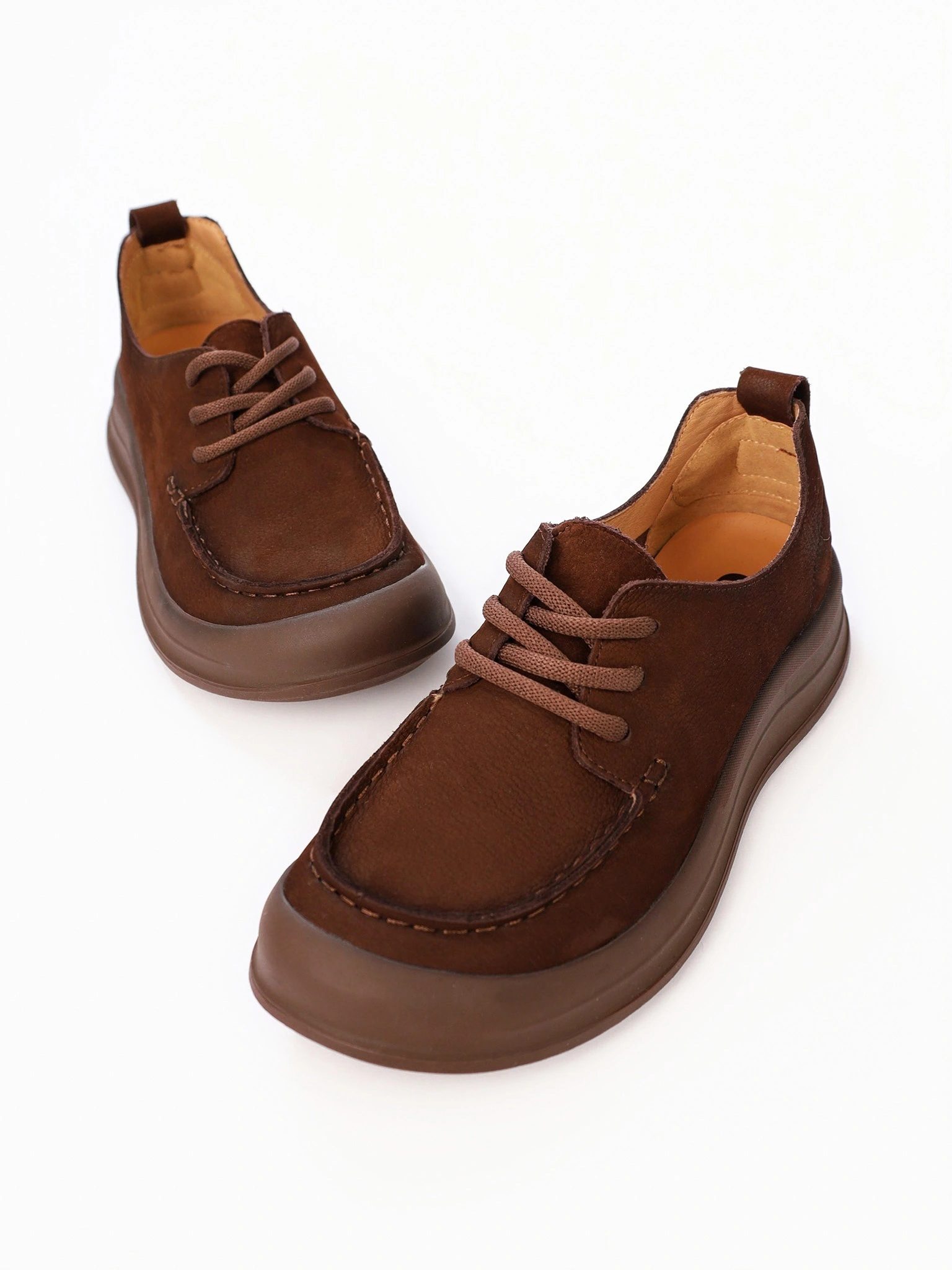 Лоферы темно-коричневого цвета из натурального нубука на низкой подошве